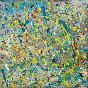 Abstract acrylic painting with vivid splatters and strokes of yellow, red, green, and blue over a soft blue and grey background, creating energetic movement and layered texture.